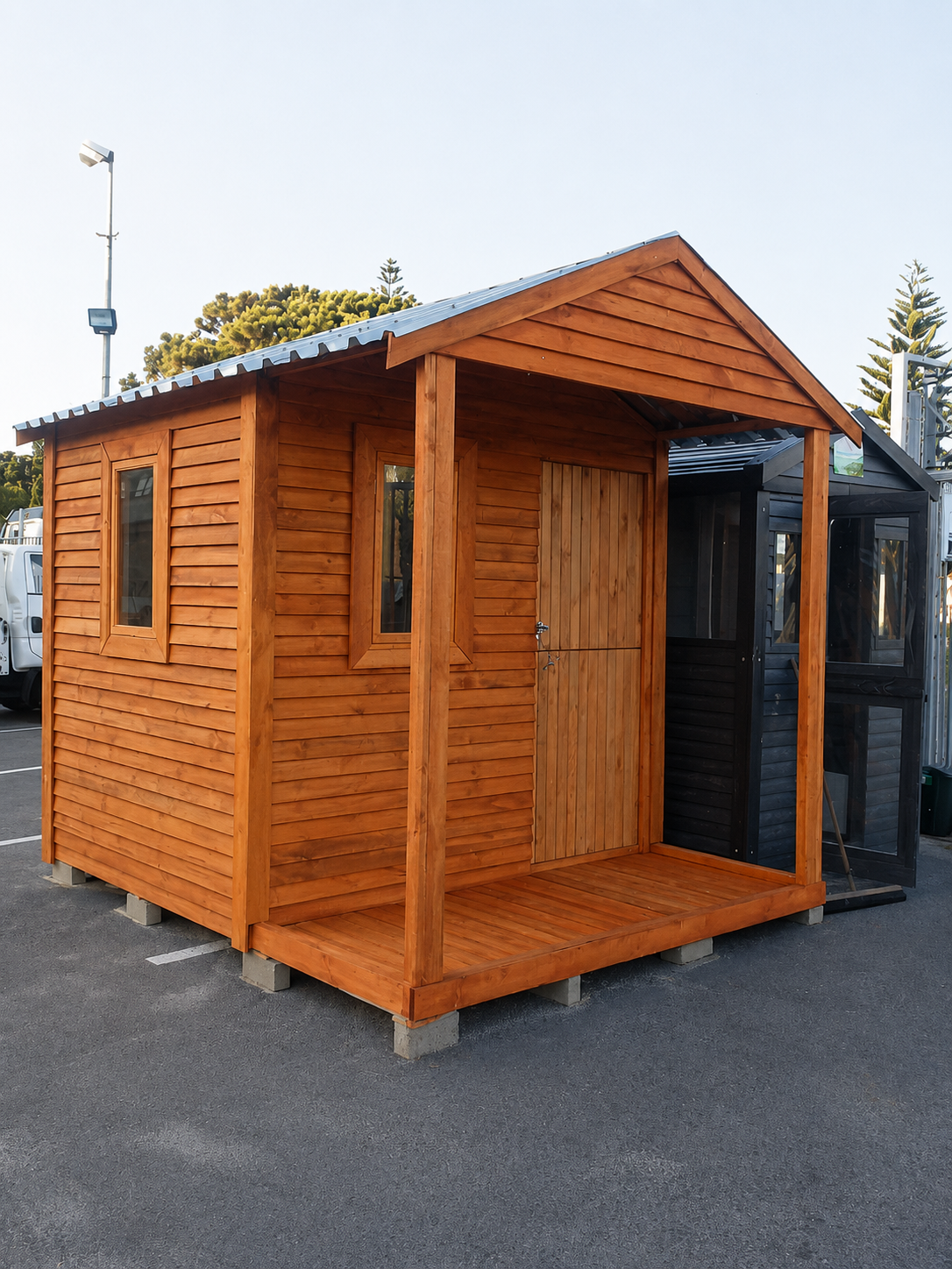 Real timber Wendy house project with a covered porch